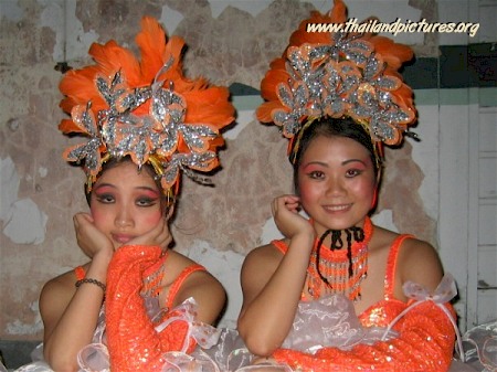 Two Thai dancers waiting for the show to start.