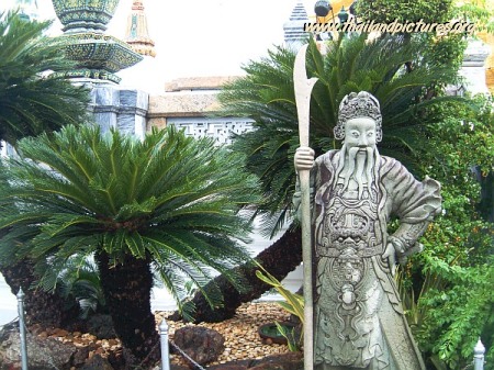 A temple guard in front of a temple